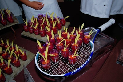 Heartbeat served shot glasses of watermelon gazpacho with swordfish ceviche on top of tennis rackets.