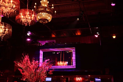 Giant mirrors with gilded frames added some fancy elements to the normally bare venue.