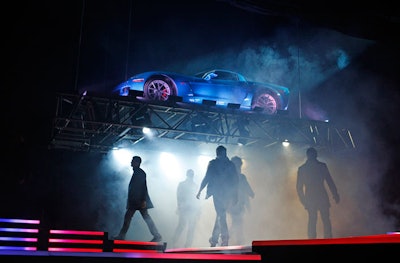 During the fashion show, a Corvette from event sponsor Chevy descended onto the stage in a cloud of smoke.