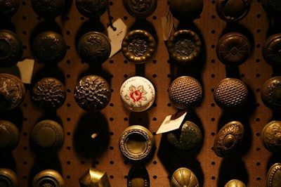 Salvaged items such as these vintage doorknobs abound at the architecturally focused venue.