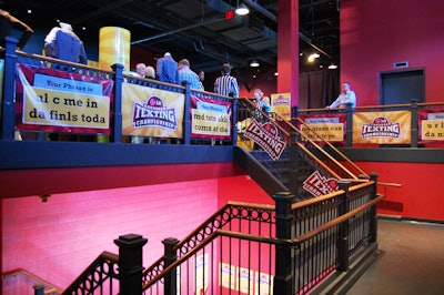 LG signs decorated the stairwell leading to the main event space on the second floor of the Diesel Playhouse.