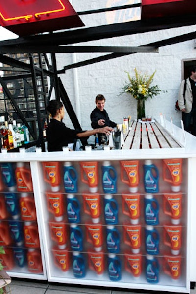 BMF covered the existing bar with an artsy installation of Tide and Downy bottles.