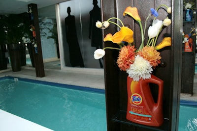 Florist Deborah Herbertson placed bouquets of flowers in empty laundry detergent bottles.