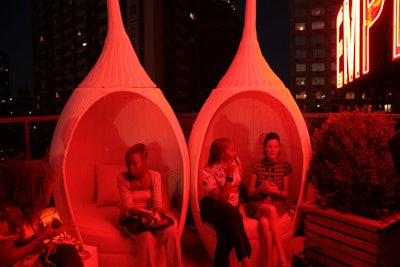 Elsewhere in the venue, wicker pods provided seating for guests.