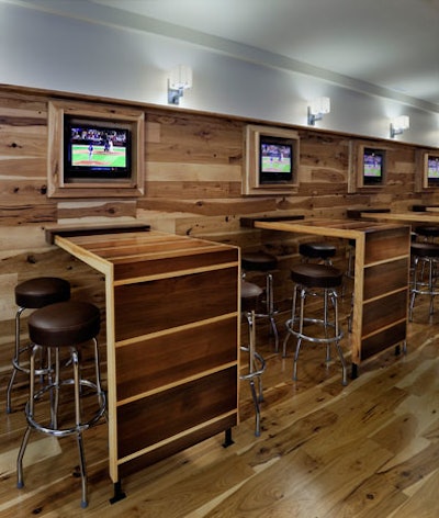 Individual flat-screen TVs are often tuned to sporting events.