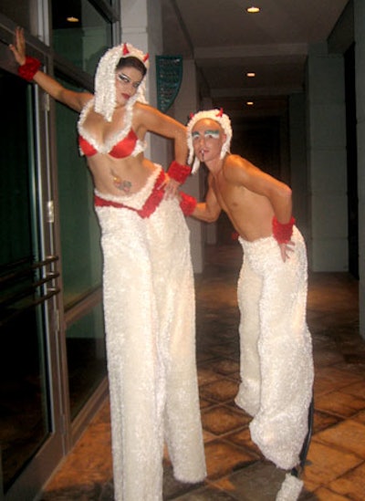 A pair of minotaur-dressed performers on stilts mixed and mingled with partygoers.