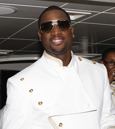 Event host and gold medal-winner Dwyane Wade arrived via yacht to Nikki Marina.