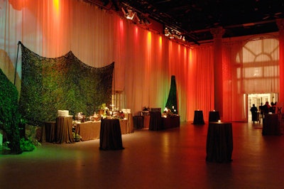 Green camouflage nets and shrubs served as a backdrop for several of the food stations.