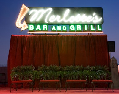A neon sign announced Merlotte's, the local watering hole on the show.