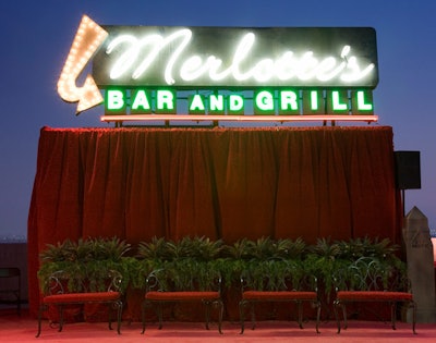 A neon sign announced Merlotte's, the local watering hole on the show.