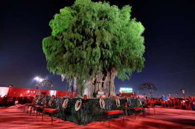 A metal structure supported a 30-foot-tall bayou-inspired tree with 340 branches.