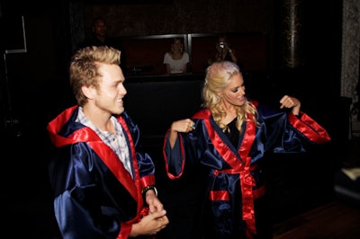Competing celebrities wore boxing robes before stepping into the ring.