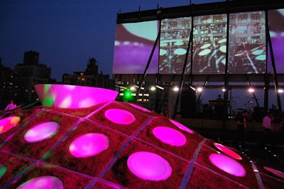 Seating pods in the grassy knoll at Mini's rooftop gave partygoers a place to relax and provided a perch to see the stage.