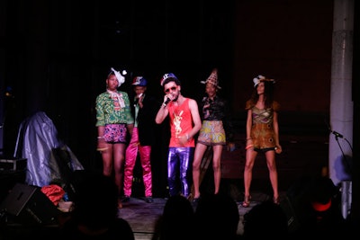Taz Arnold, a rapper who also goes by the name TI$A, performed for the Interview crowd, encouraging guests to sing along to his 'Vote Obama.'