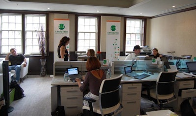 The new Grand & Toy-sponsored media centre in the IT Lounge included ergonomically friendly desk furniture and mini HP laptops.