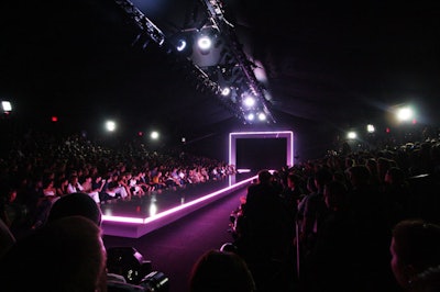 A custom white Formica laminate proscenium arch embedded with LEDs marked the entrance to Rock & Republic's catwalk. Versatube lights illuminated the side of the runway in purple.
