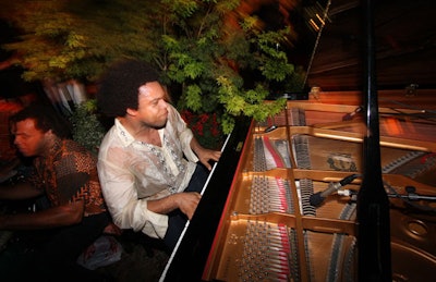 The performance by pianist Eric Lewis continued long after the last model came out.