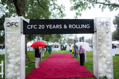 A banner announcing the Canadian Film Centre's 20th anniversary, and a fuchsia carpet, marked the entrance to the organization's annual TIFF barbecue.
