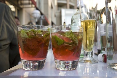 At the after-party, guests lined up for drinks, such as raspberry mojitos, at the two bars on the patio near the garden lawn.