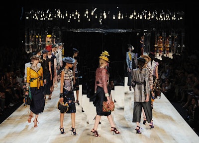 Marc Jacobs showcased his collection on a sloping runway filled with free-standing mirrors and lit with bare bulbs.