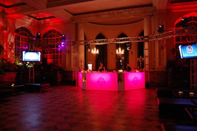 The event team from the Liberty Grand used steel trusses to hang lighting above the bar in the dance area.