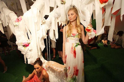 The early-morning presentation of the spring 2009 Alice & Olivia collection included Astroturf flooring, bales of hay, butterflies lining the walls, and a tree-shaped piece covered in toilet paper.
