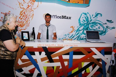 The OfficeMax lounge incorporated several designs from the new Bazaar collection and also featured a bar covered with color strips and inspired by rubber band balls.