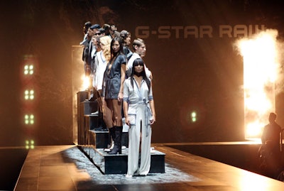Several adjacent sections of the runway at G-Star's show raised and lowered, forming stairs for the models to walk on. The show ended on this segment of the catwalk, with models posing on the different levels.