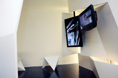 The fourth-floor media room housed the work of architect Luca Andrisan, whose bending walls and multiple televisions sought to capture the identity of Showtime as a whole.