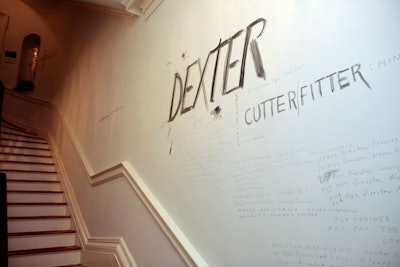 Names of the cast and crew of all the series highlighted in the show house were scrawled into the stairwell's otherwise bare walls.