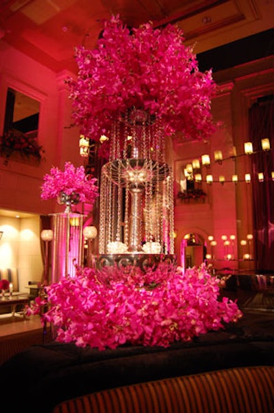 An arrangement of pink orchids from Forget Me Not Flowers provided a focal point in the centre of the room.