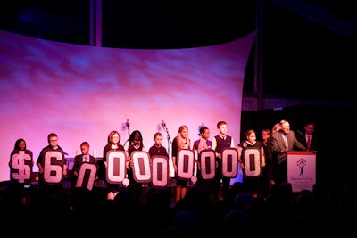 Children who had been treated at the hospital helped announce the campaign goal with glittery signage.