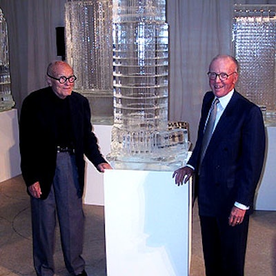 Philip Johnson and Gerald Hines posed next to an ice sculpture of one of their collaborations, 101 California Street in San Francisco, at a benefit for the Center for Architecture at the Guggenheim Museum.