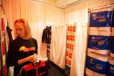 The walls of the makeshift dressing rooms were built out of stacks of Target brand paper towels and bath tissue.