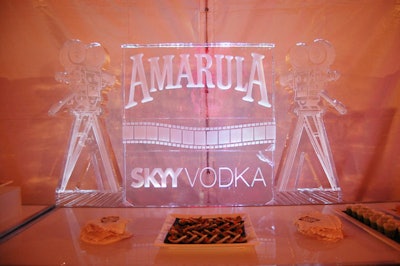 An ice sculpture featuring two film cameras displayed the names of event sponsors Amarula and Skyy Vodka.