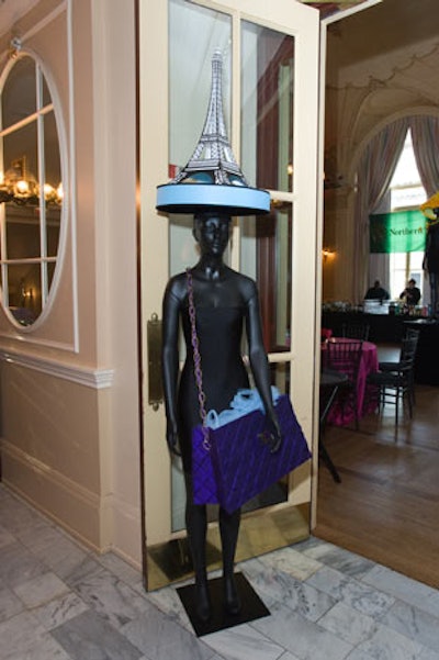 Kehoe Designs decorated the Symphony Center's Grainger ballroom with black-painted mannequins wearing elaborate hats.