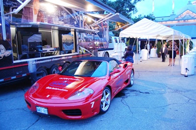 The AutomotiveStreetStyle.com trailer and several sports cars sat outside Muzik—and on the tented red carpet—for the cocktail party.