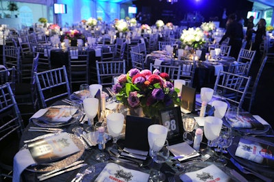 Solutions With Impact dressed the gala dinner in black and silver and topped tables with centrepieces from San Remo Florist.