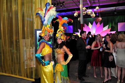 Models in Carmen Miranda-style costumes welcomed guests to the party.