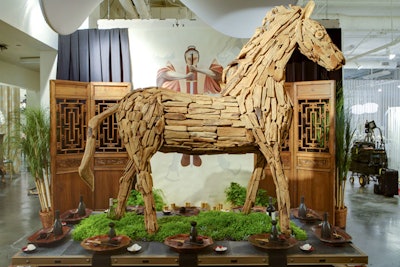 Paige and Coleman's East Asian-influenced table featured an enormous driftwood horse atop a mossy bed as the centerpiece.