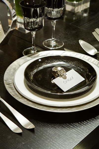 Place-card holders in the shape of skulls added a Gothic touch to one of the L.A. Mart's two tables.