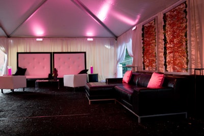 Black and white leather couches provided places for guests to perch inside the tent.