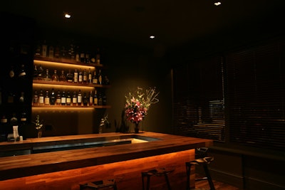 An intimate bar area seats 10.
