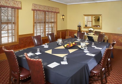 The property features three executive board rooms, each with outdoor patio space.