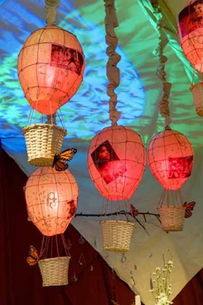 Soolip and Floracopia's designers fashioned paper lanterns to look like mini hot air balloons, suspending small baskets beneath them for a playful touch.