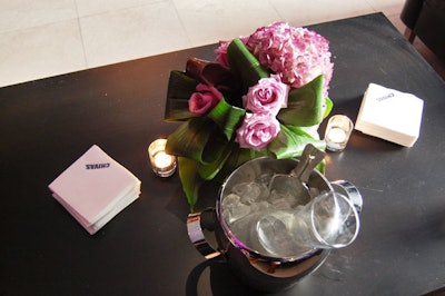 Buckets on tables allowed guests to add ice or water to their scotch, which was served neat.