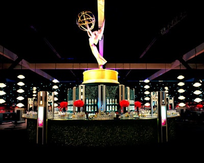 A giant Emmy statuette sat over a central bar.