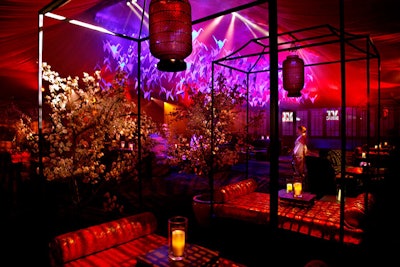 Lanterns and cherry blossom trees decorated seating areas.