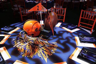 Football-appropriate centerpieces featured pom-poms, helmets, and pennants.