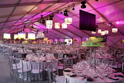 Plasma and video screens hanging from the tent's roof showcased sponsor logos and pictures of lamps from the 'tabletop art gallery.'